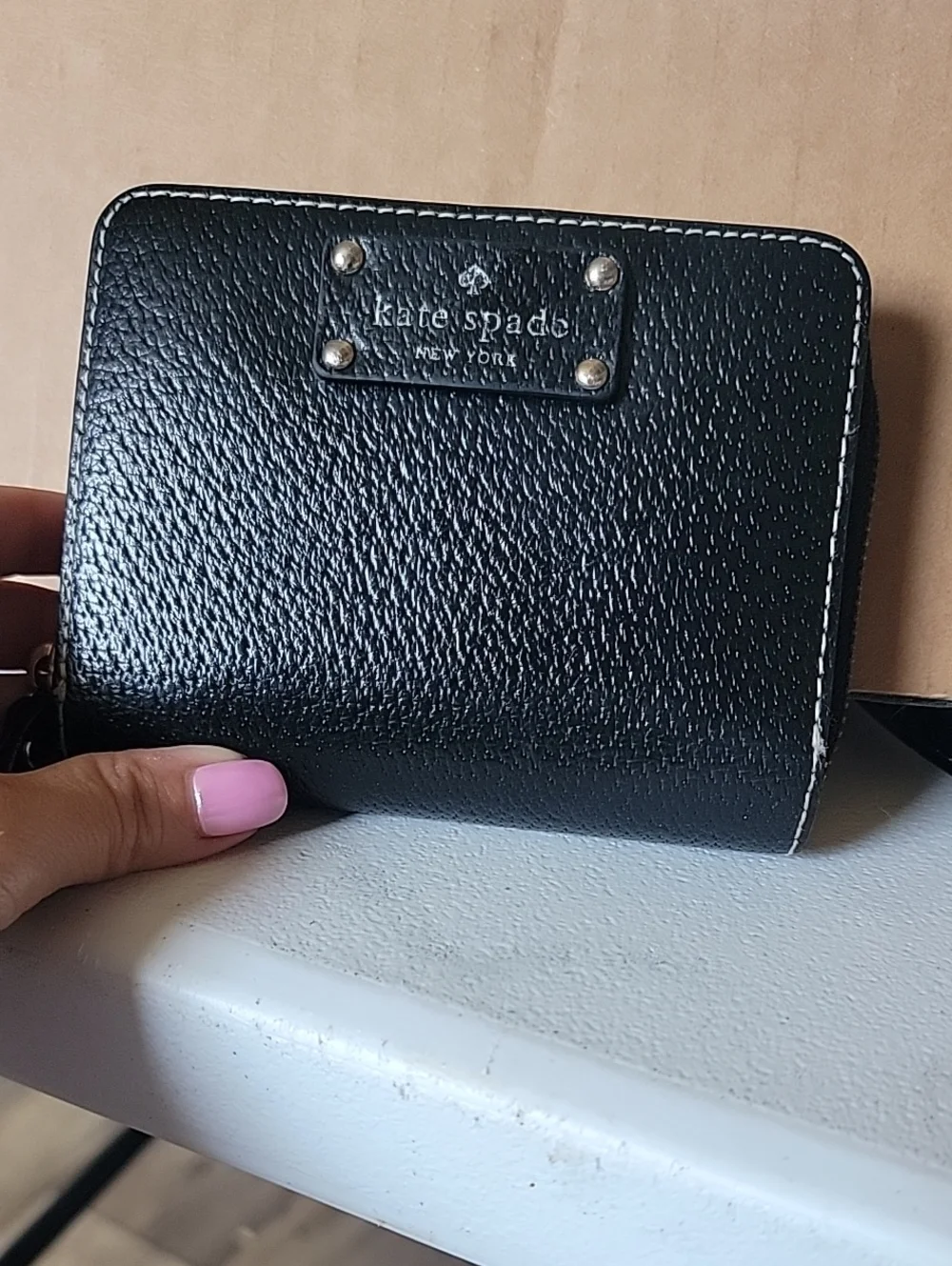 kate spade Black Pebbled Zip-Around Wallet with Gold Hardware